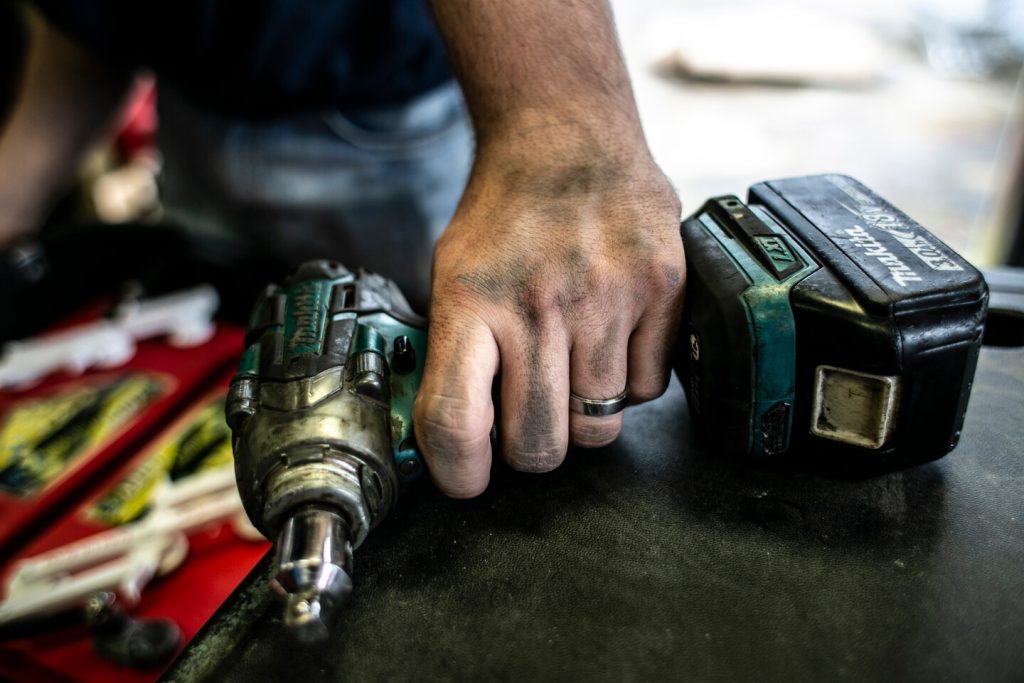 man working with nail
